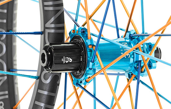 Industry nine blue hub with orange and blue spokes