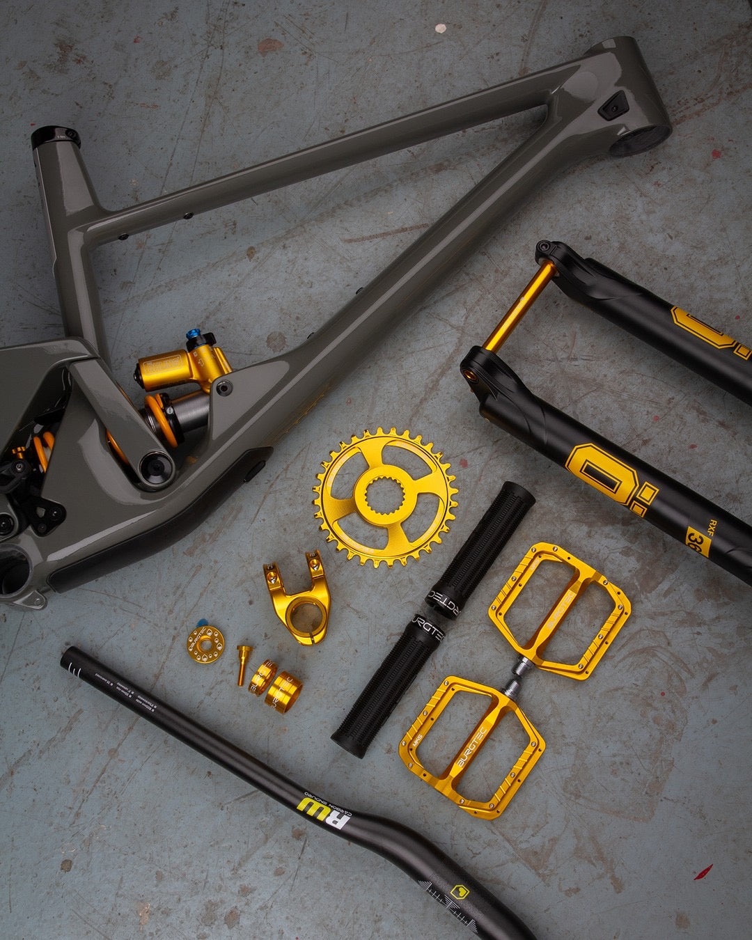 Gold Burgtec Parts on a SCOR bike