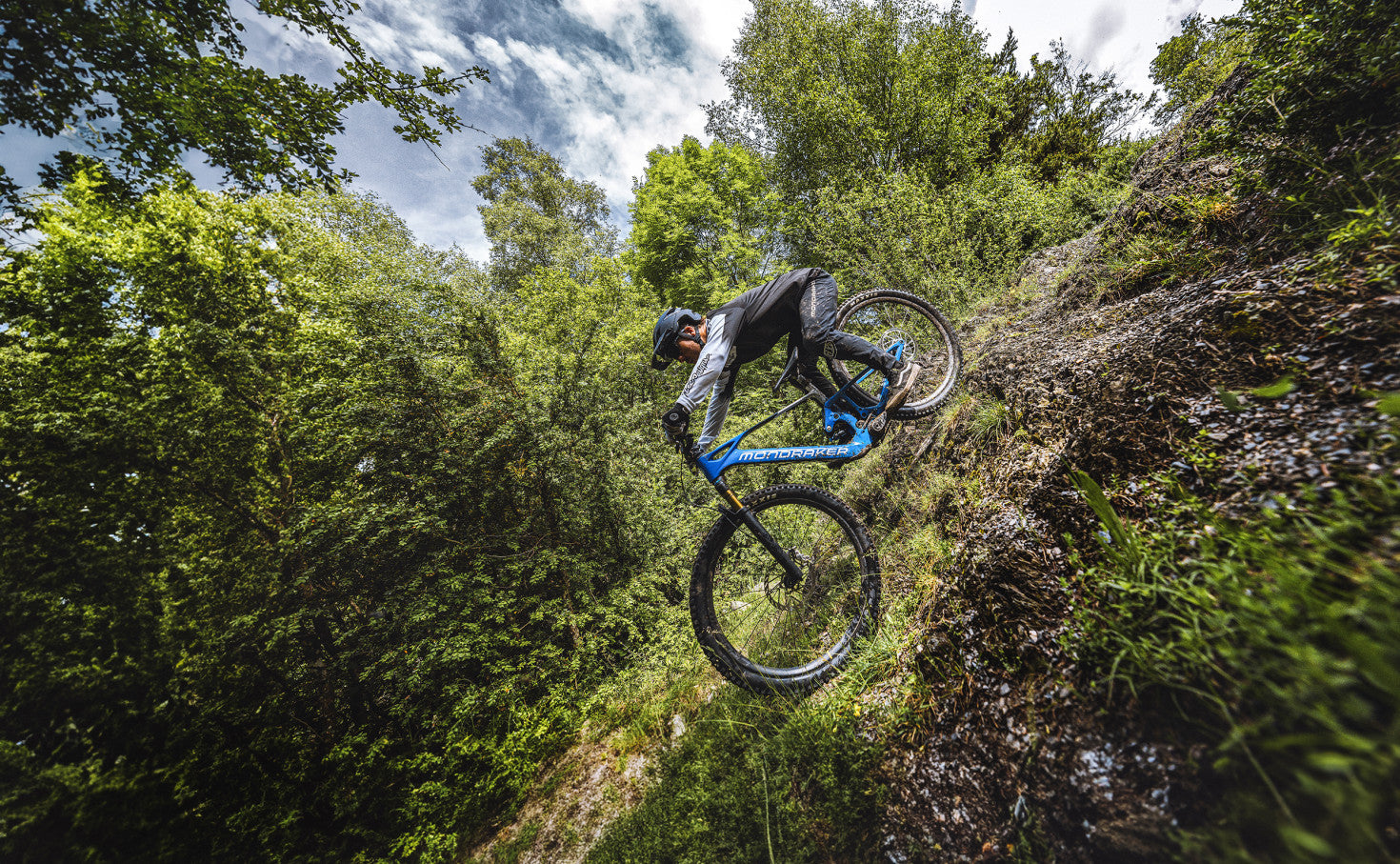 Mondraker Neat riding down steep trails