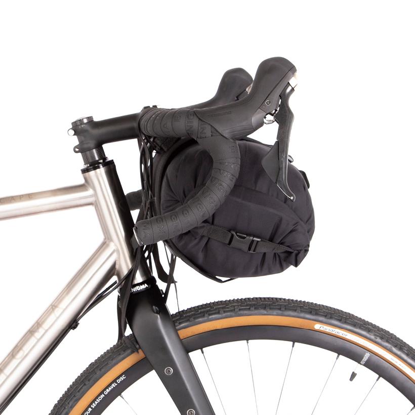 Restrap handlebar bag attached to gravel bike